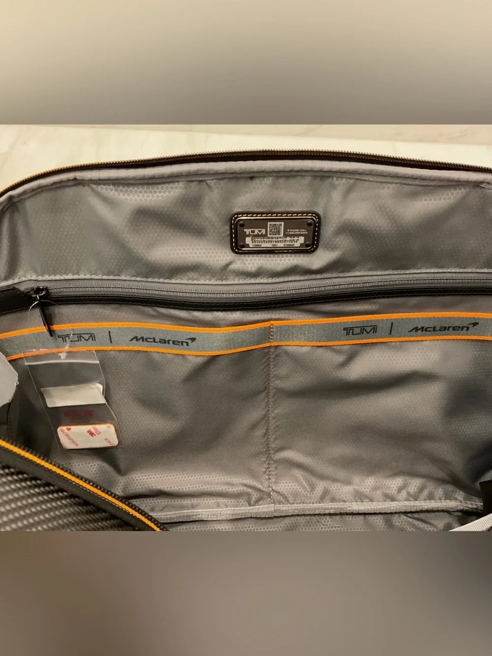 NEW Tumi McLaren QUANTUM 21.5” Duffel Bag - BLACK with PAPAYA ORANGE Accents